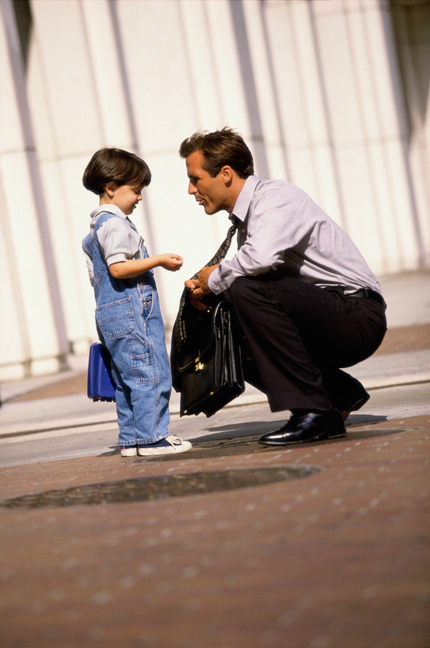 Dad speaking to child outside courthouse