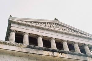 Top of courthouse visible over low wall