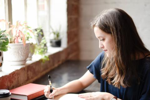 Woman working at a coffee shop