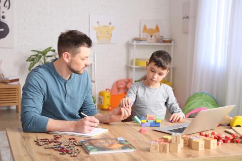 Child working with therapist. 