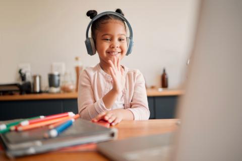 Little girl on video call.