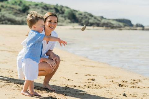 Mom and son at the beach. 