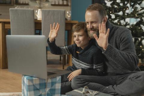 Dad and son on video call.