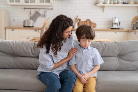 Mom and son having a serious conversation.