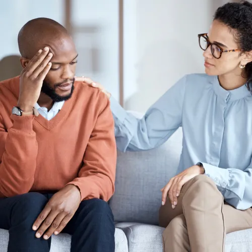 Man talking to mental health professional. 