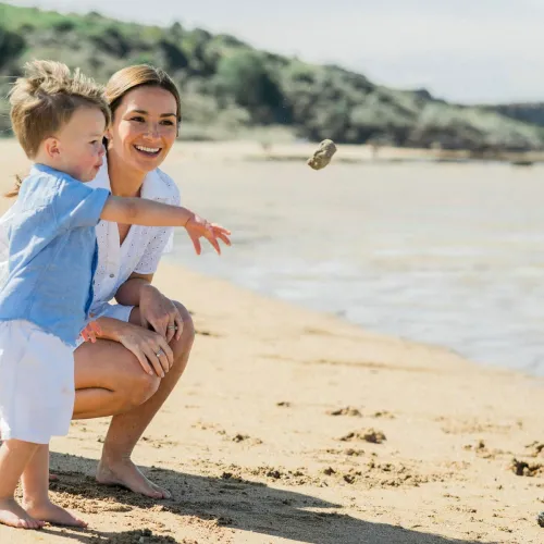 Mom and son at the beach. 