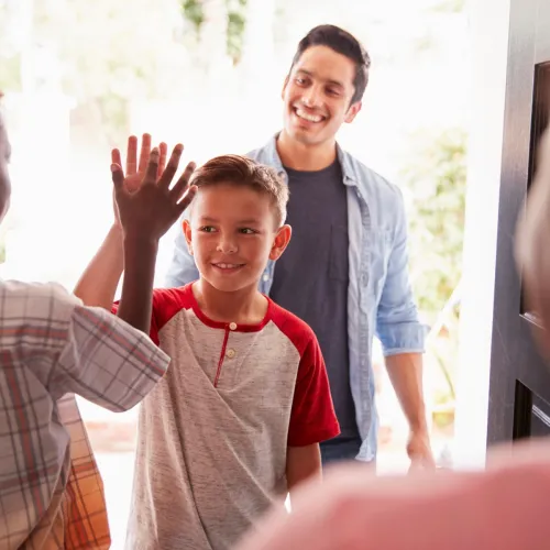 Dad dropping child off at their other parents' house
