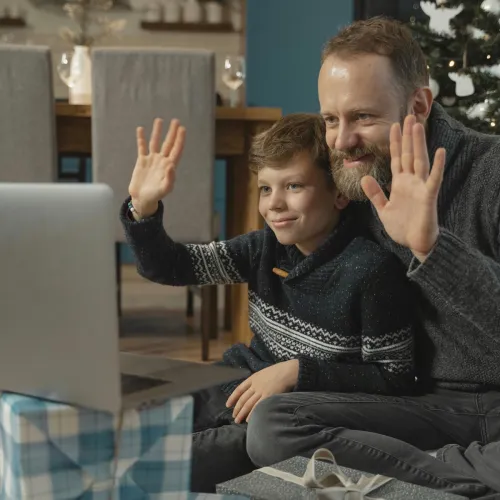 Dad and son on video call.