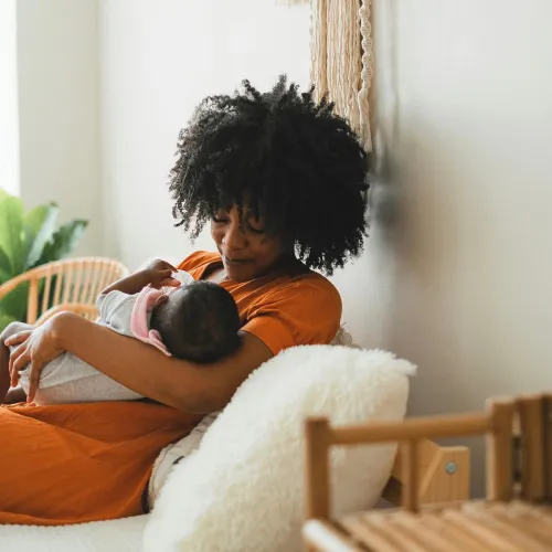 Mother holding her baby