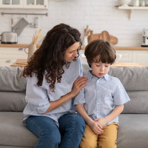 Mom and son having a serious conversation.