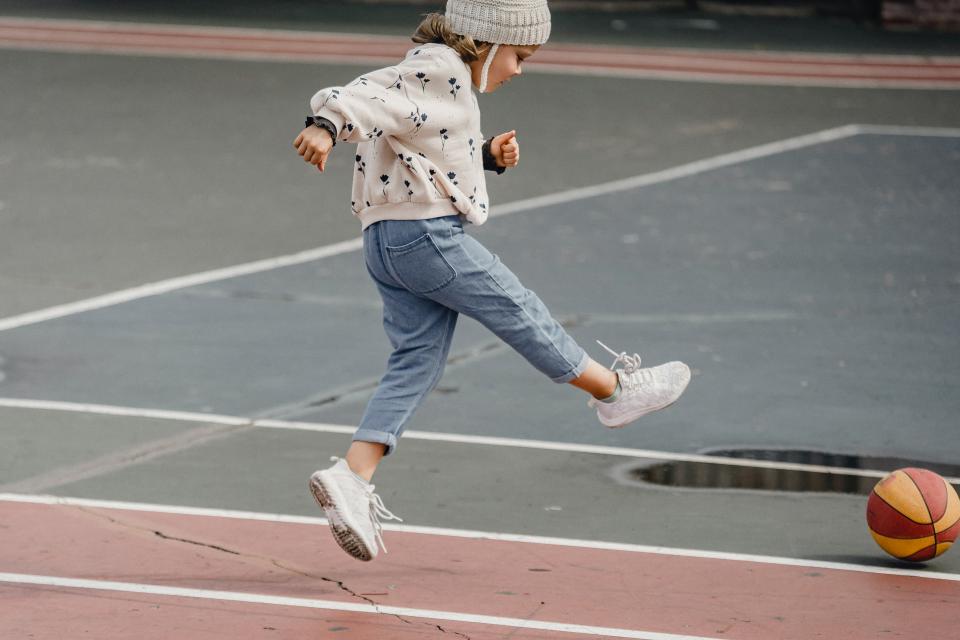 child playing with a ball