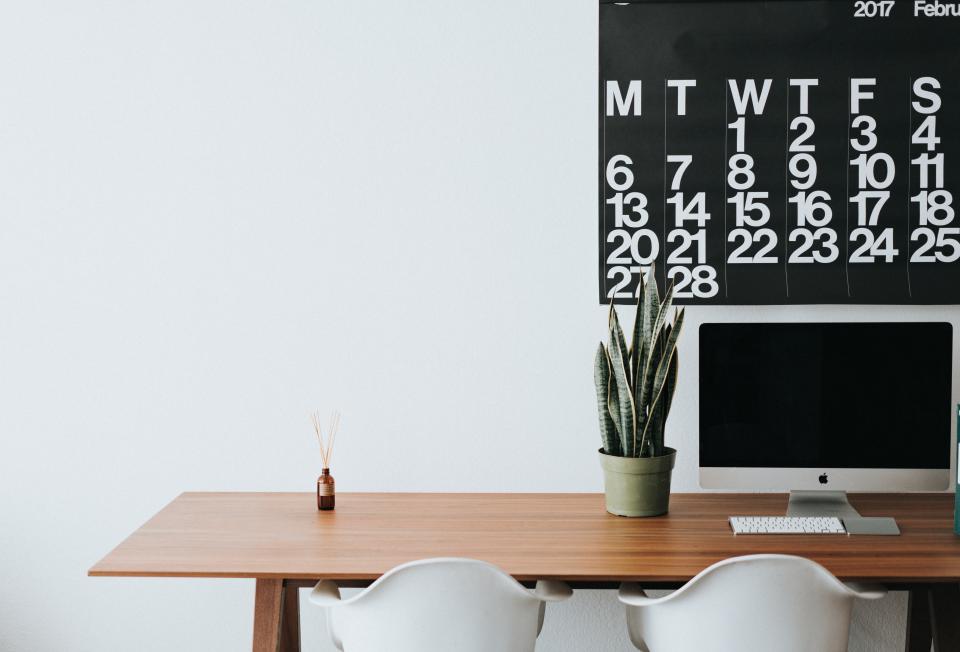 picture of black and white calendar over desk