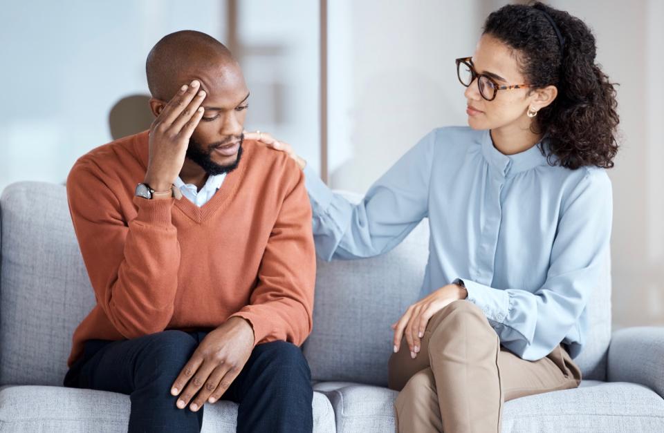 Man talking to mental health professional.