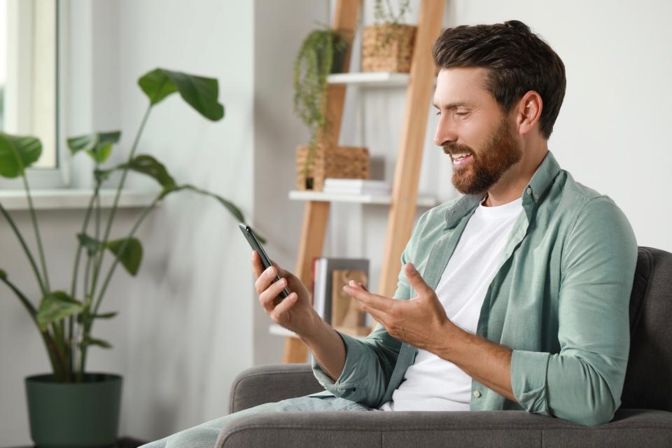 Man on video chat on his phone.