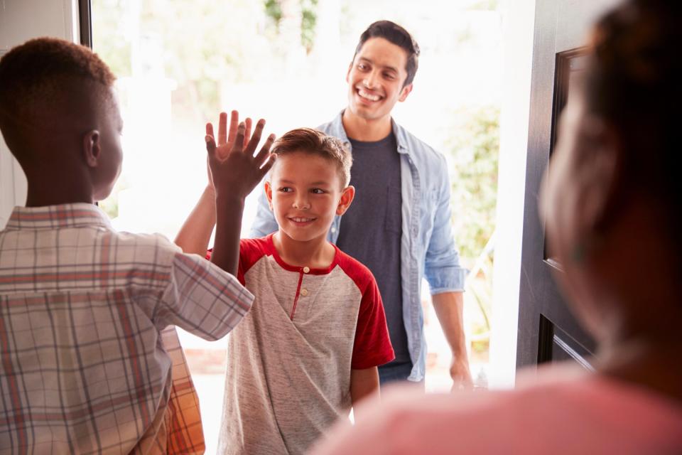 Dad dropping child off at their other parents' house