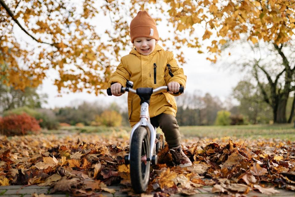 Little boy biking.