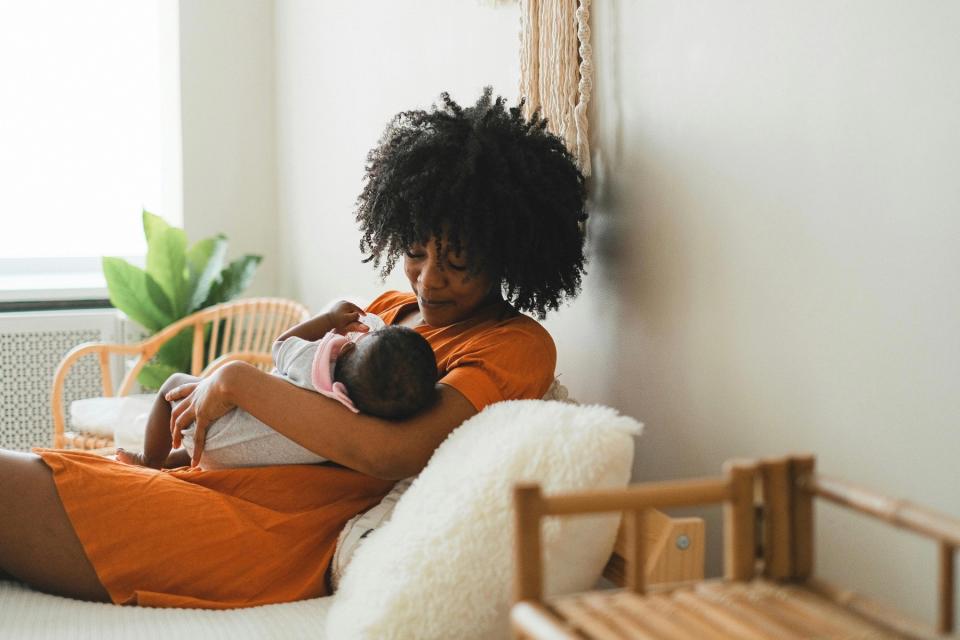 Mother holding her baby